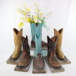 Cowboy boot flower holder centerpieces for rent for rustic montana wedding