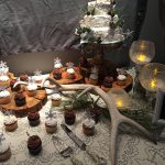 antler and wood round cake stands and servers for rent for rustic montana wedding