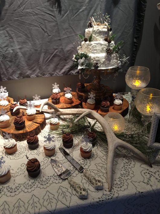 antler and wood round cake stands and servers for rent for rustic montana wedding